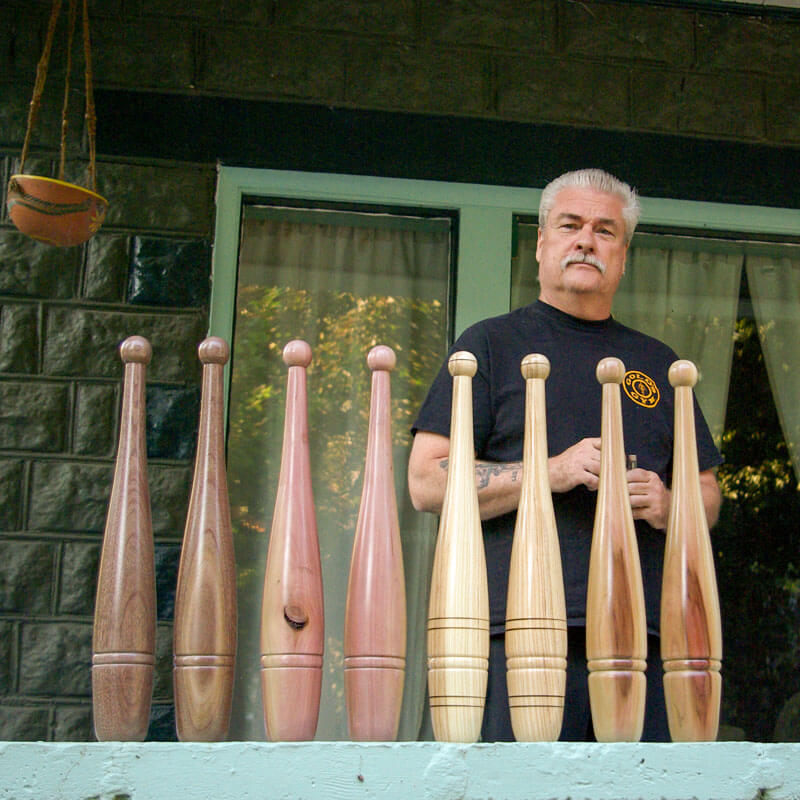 Mike Romiski with Indian Clubs